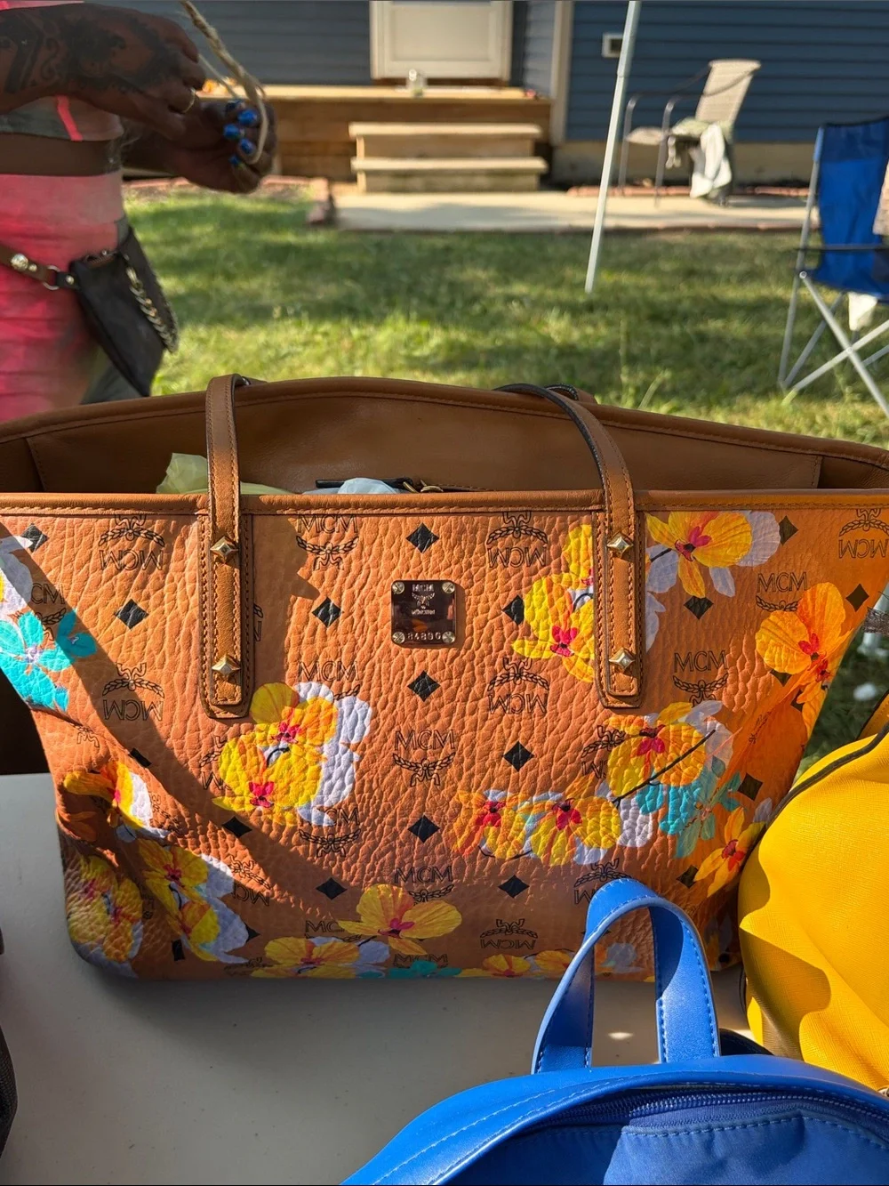Authentic MCM Cognac Floral Visetos Tote with Yellow & Blue Accents